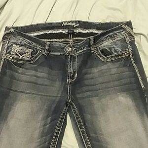 Amethyst Dark and faded blue jeans